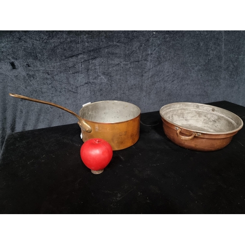788 - Two antique copper items including a saucepan and double handled pot.