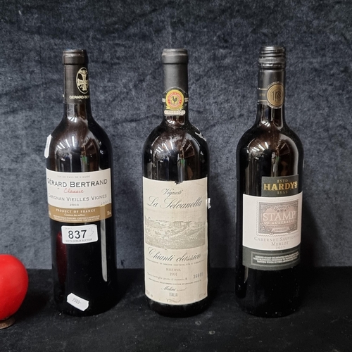 837 - Three bottles of red wine including a 2003 Gerard Bertrand Carignan Vielles Vignes, a 1991 La Selvan... 