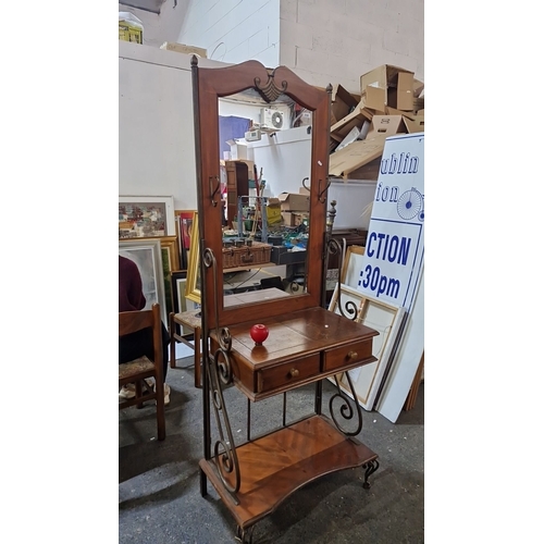 918 - A handsome hallstand with mirror, two drawers, and lower shelf. Features ornate carvings and wrought... 