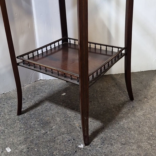 921 - Star Lot : A Mahogany Collector display table with glass top, lower shelf, and brass gallery, Art De... 