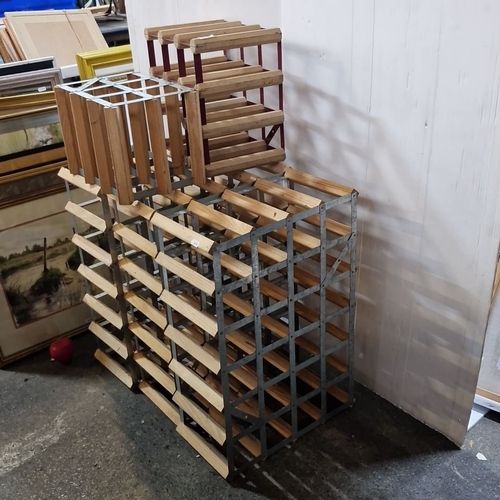 924 - Collection of wooden and metal wine racks in various sizes. Three big and 2 small.