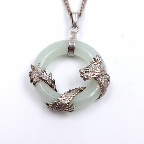 502 - A most attractive Chinese jade and sterling silver 925 dragon mounted pendant with bright cut silver... 