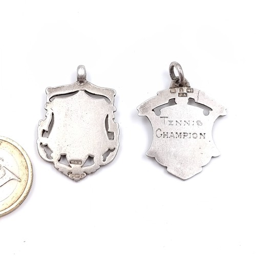 509 - Two antique sterling silver medallion pendants one featuring an inlaid gold panel hallmarked Birming... 
