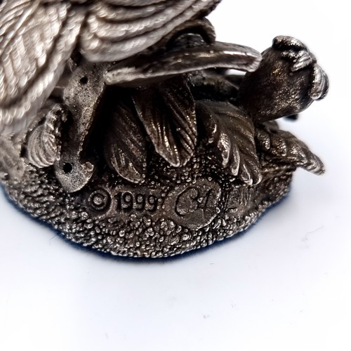 534 - A f sterling silver 1999 C4 Langford hallmarked bird figure. 5cm height. Total Weight - 58.52 grams.... 