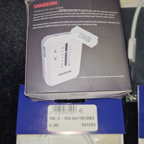 138 - Sangean Pocket 320 SR-32 radio, boxed. Three USB-C to RJ45 adapter cables, packaged. These items are... 