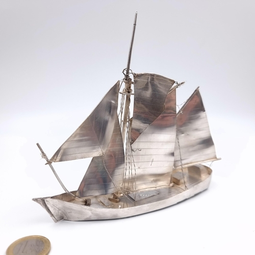 144 - Star Lot: An attractive sterling silver Schooner style vessel. Hallmarked London, 1970. Weight 108 g... 