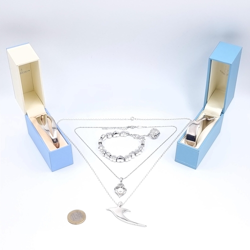 160 - Five Newbridge Silverware jewellery items including two bangle bracelets, an imitation pearl pendant... 