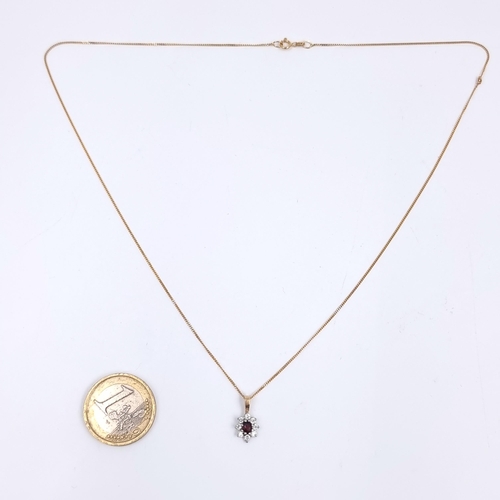 169 - Star Lot: A very pretty nine carat gold garnet and gemstone pendant necklace (375). Length 44cm. Wei... 