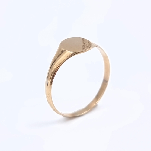 173 - Star Lot: A gents nine carat gold 375 signet ring. Size S1/2. Weight 1.18 grams.