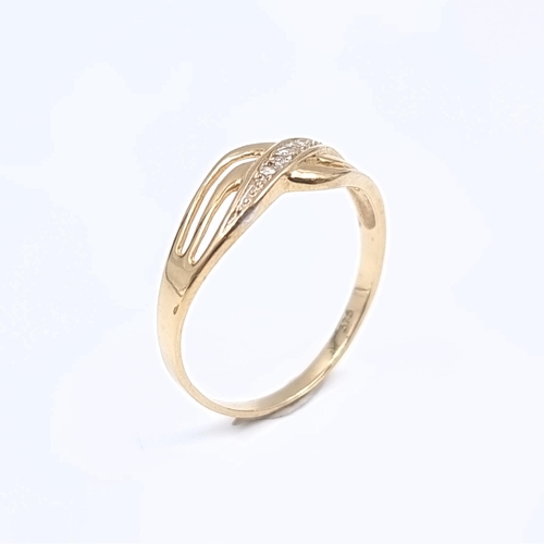 180 - Star Lot: A beautiful diamond ring set in nine carat gold 375. Size O1/2. Weight 1.20 grams.