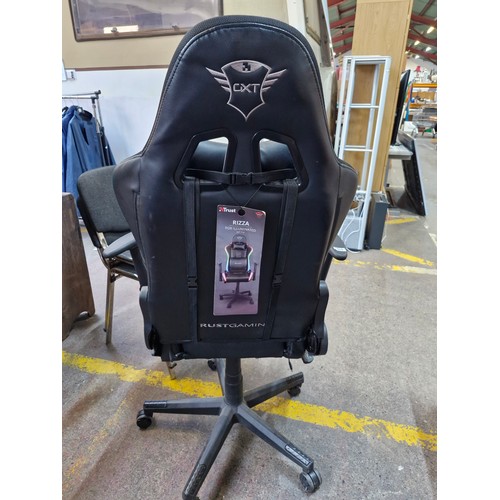 19 - A Trust GXT 708B Black Gaming Chair. RRP €239.95 A bread new chair from technology cafe.