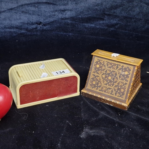 Two super examples of cigarette boxes including a Rolinx Bakelite cigarette  dispenser and a further