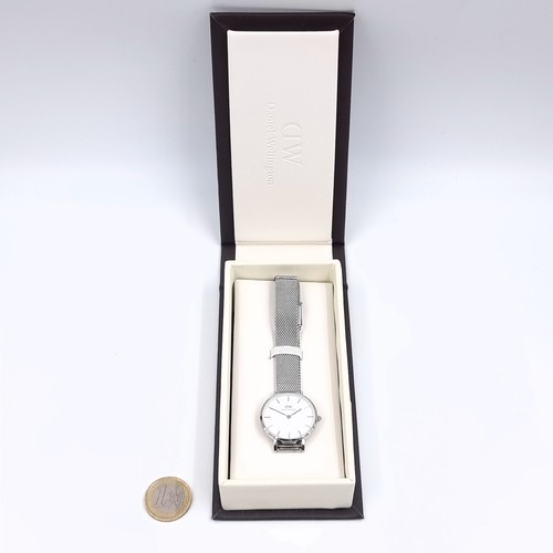 159 - A mid sized Daniel Wellington designer wrist watch with baton dial set with associated mesh bracelet... 