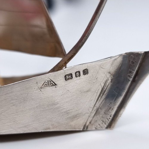 144 - Star Lot: An attractive sterling silver Schooner style vessel. Hallmarked London, 1970. Weight 108 g... 