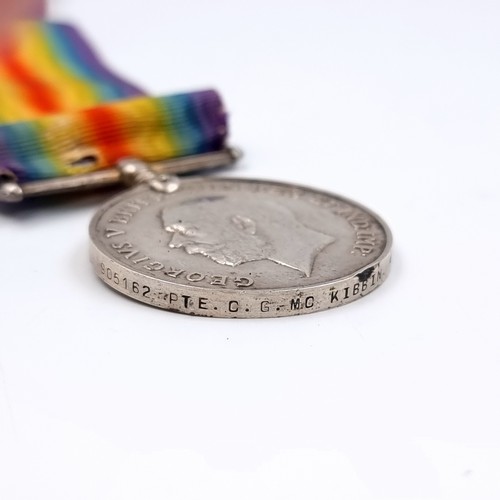 146 - A group of three medals awarded to Private C.G. McKibben, service number 905162, of the 49th Battali... 
