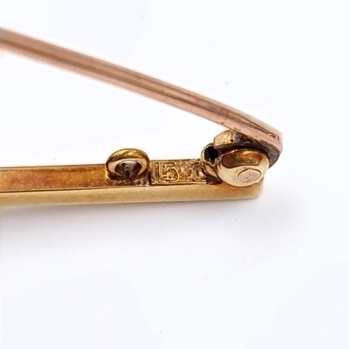 149 - Star Lot: A beautiful 15 carat gold garnet and seed pearl brooch. Length 5.5cm. Weight 3.6 grams. Pr... 