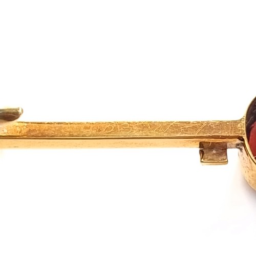 149 - Star Lot: A beautiful 15 carat gold garnet and seed pearl brooch. Length 5.5cm. Weight 3.6 grams. Pr... 