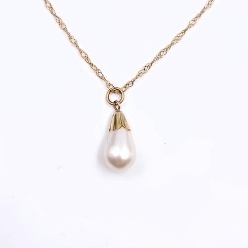 156 - Star Lot: A nine carat gold (9K) pearl pendant necklace. Length 46cm. Weight 1.10 grams. Boxed.