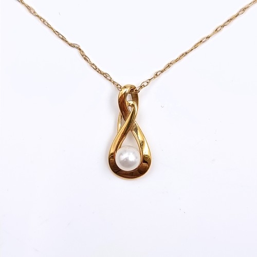 158 - Star Lot: A pretty nine carat gold 375 pearl pendant and chain. Length 46cm. Weight 1.34 grams.