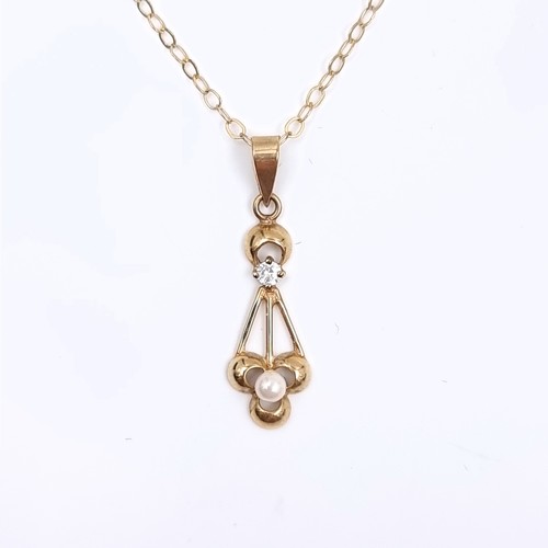 165 - Star Lot: A nine carat gold gemstone and pearl pendant, together with a nine carat gold chain. Lengt... 
