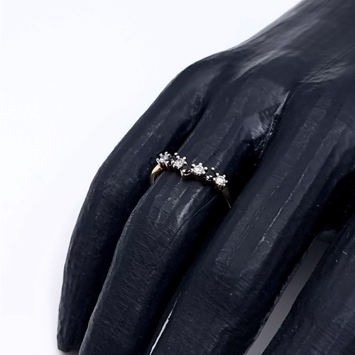 174 - Star Lot: A nine carat gold 375 gemstone wishbone ring. Size P. Weight 1.32 grams.