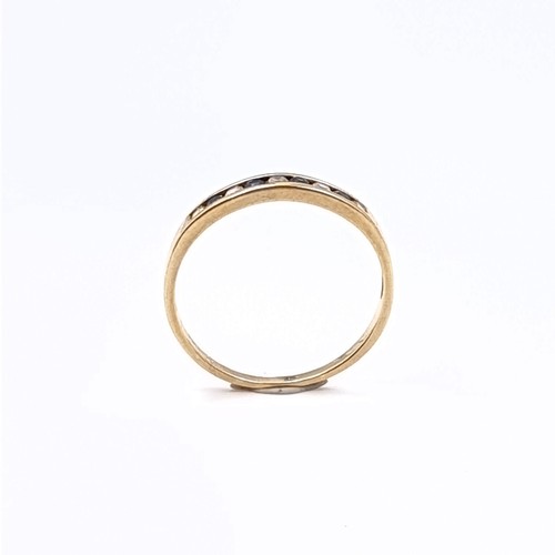 177 - Star Lot: A sapphire and gemstone half eternity ring set in nine carat gold 375. Size P. Weight 1.31... 