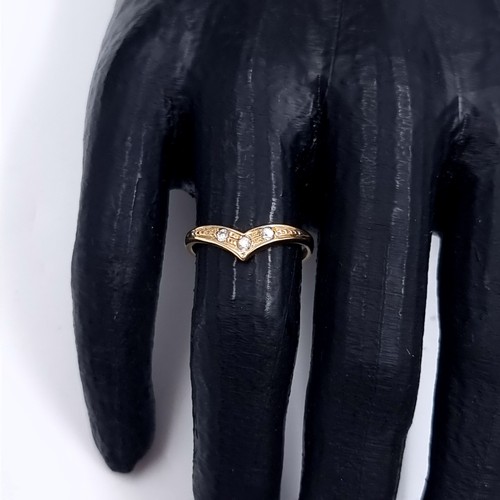 179 - Star Lot: A nine carat gold gemstone wishbone ring. Size O. Weight 1.65. No hallmarks, has been acid... 