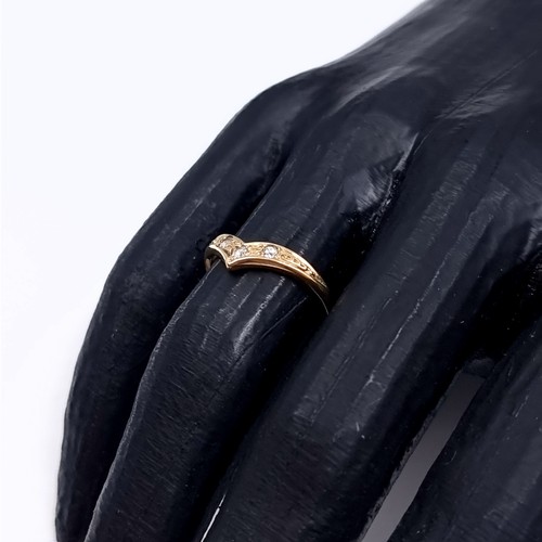 179 - Star Lot: A nine carat gold gemstone wishbone ring. Size O. Weight 1.65. No hallmarks, has been acid... 