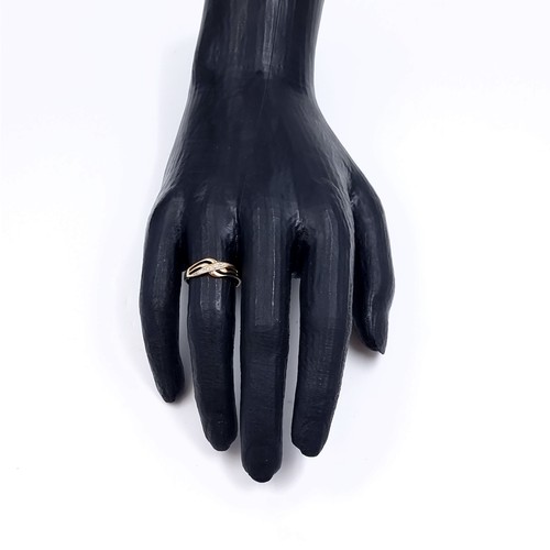 180 - Star Lot: A beautiful diamond ring set in nine carat gold 375. Size O1/2. Weight 1.20 grams.