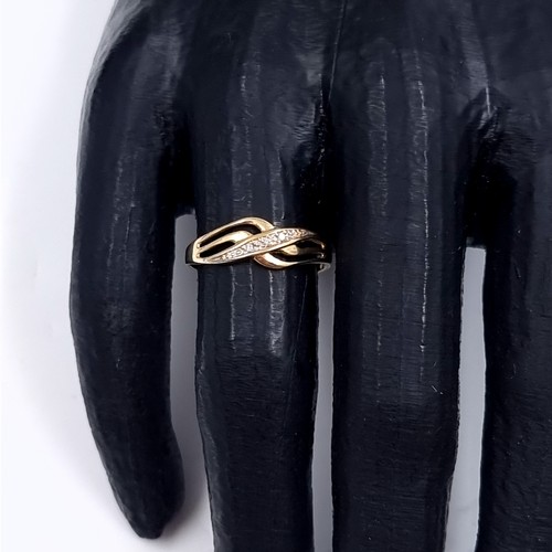 180 - Star Lot: A beautiful diamond ring set in nine carat gold 375. Size O1/2. Weight 1.20 grams.