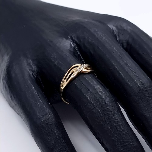 180 - Star Lot: A beautiful diamond ring set in nine carat gold 375. Size O1/2. Weight 1.20 grams.