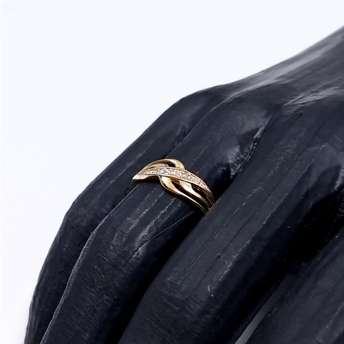 180 - Star Lot: A beautiful diamond ring set in nine carat gold 375. Size O1/2. Weight 1.20 grams.