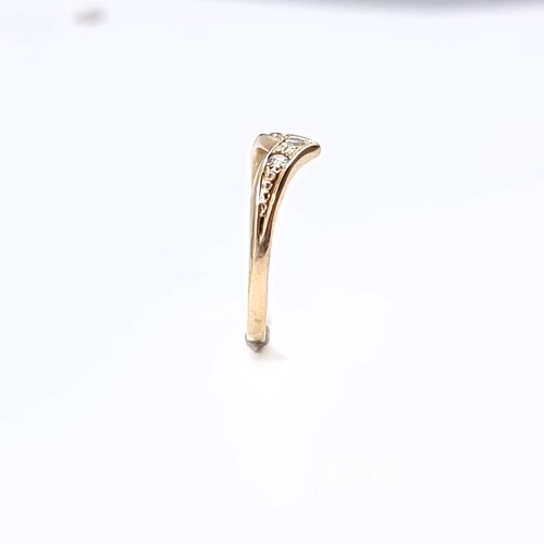179 - Star Lot: A nine carat gold gemstone wishbone ring. Size O. Weight 1.65. No hallmarks, has been acid... 