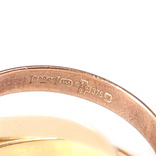 178 - Star Lot: A nine carat gold 375 tri colour Russian wedding ring. Size O. Weight 3.76 grams.