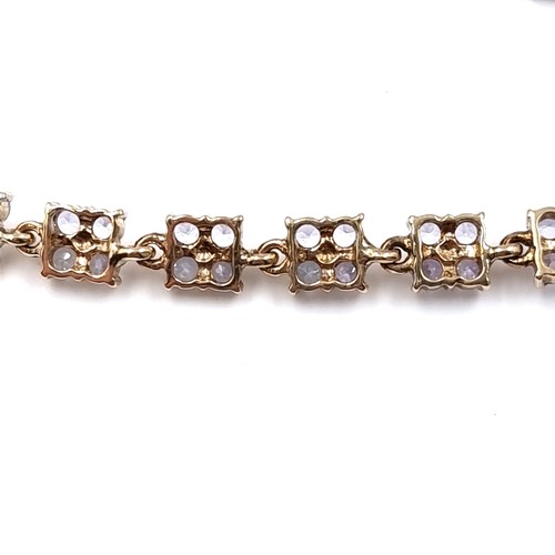 1 - Super Star Lot: A rare and beautiful tanzanite line bracelet set in nine carat gold. Weight 9 grams.... 