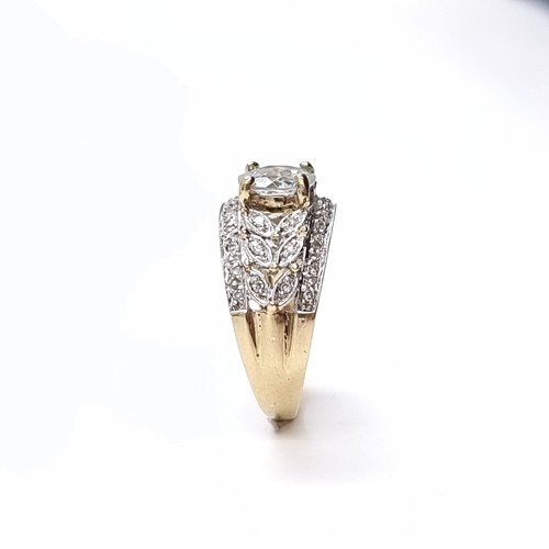 3 - Star Lot: A fine aquamarine and diamond ring set in nine carat gold. Size M. Weight 3.52 grams. Ther... 