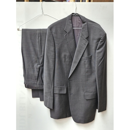 392 - A gentleman's Maurice Abrahams Dublin wool suit. Jacket size 44 - 46L and Trousers W34 L36.