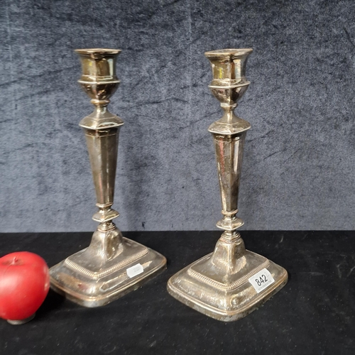 842 - A pair of large Old Sheffield plate candlesticks. Mark of A. Goodman & Co circa 1800. Repair work ma... 