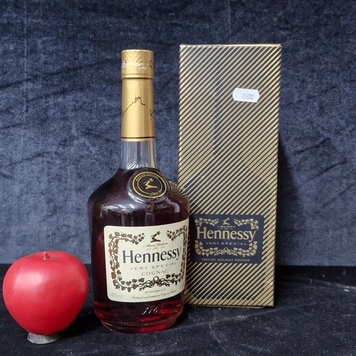 871 - A vintage sealed 70cl bottle of Hennessy Very Special Special Holiday Edition, complete in presentat... 