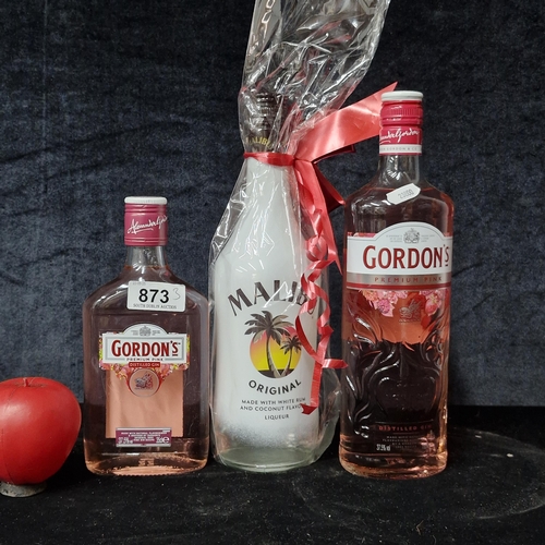873 - Three sealed bottles of alcohol including two bottles of Gordon's Pink Gin, 70cl & 35cl. Along with ... 