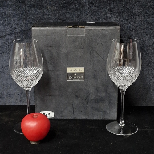 880 - A pair of as new John Rocha for Waterford Crystal lume red wine glasses. Complete in original presen... 