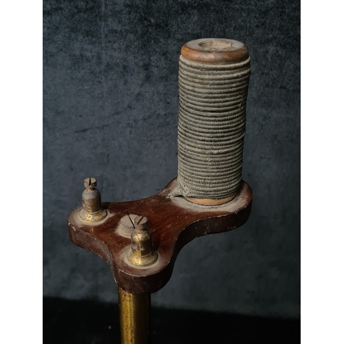 865 - Two antique scientific instruments including a P. Harris Ltd Dublin stand along with one other scien... 