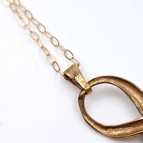 32 - Star Lot: A nine carat gold 375 sapphire and gemstone pendant necklace. Length 44cm. Weight 1.11 gra... 