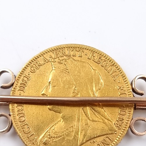 25 - Star Lot: A gold sovereign mounted on a 9ct brooch depicting Victoria Jubilee head dated 1896. Pin i... 