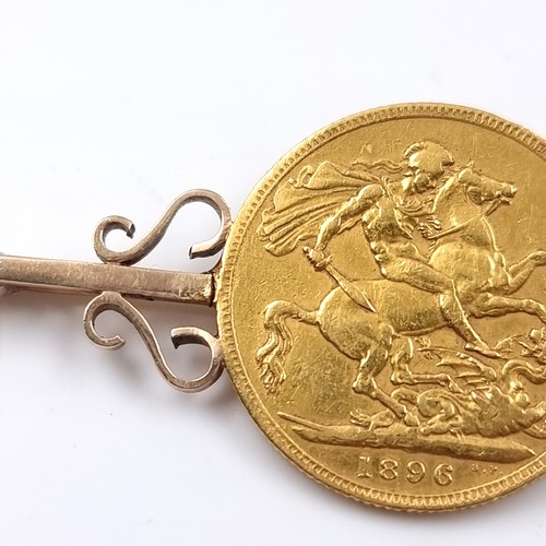 25 - Star Lot: A gold sovereign mounted on a 9ct brooch depicting Victoria Jubilee head dated 1896. Pin i... 