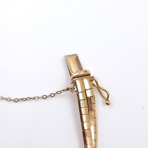 28 - Star Lot: An 18 carat gold 750 twin band bracelet set with safety chain. Weight 15.79 grams.

There ... 