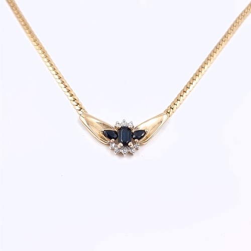 41 - Super Star Lot: An impressive sapphire and diamond pendant necklace set in 14 carat gold chain marke... 