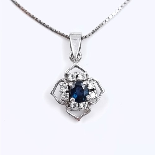 17 - A sapphire and white spinel pendant necklace set in sterling silver. Length 44cm. Weight 3.1 grams. ... 