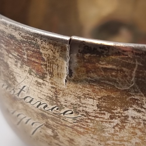 37 - A sterling silver dish rim with slight split. Hallmarked London, 1919. With faint inscription, easil... 