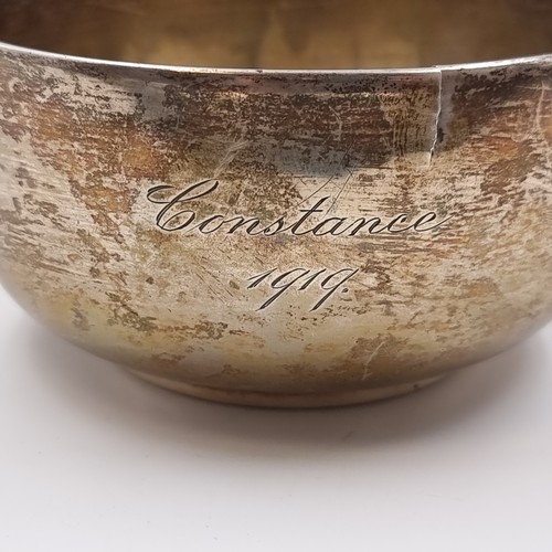 37 - A sterling silver dish rim with slight split. Hallmarked London, 1919. With faint inscription, easil... 